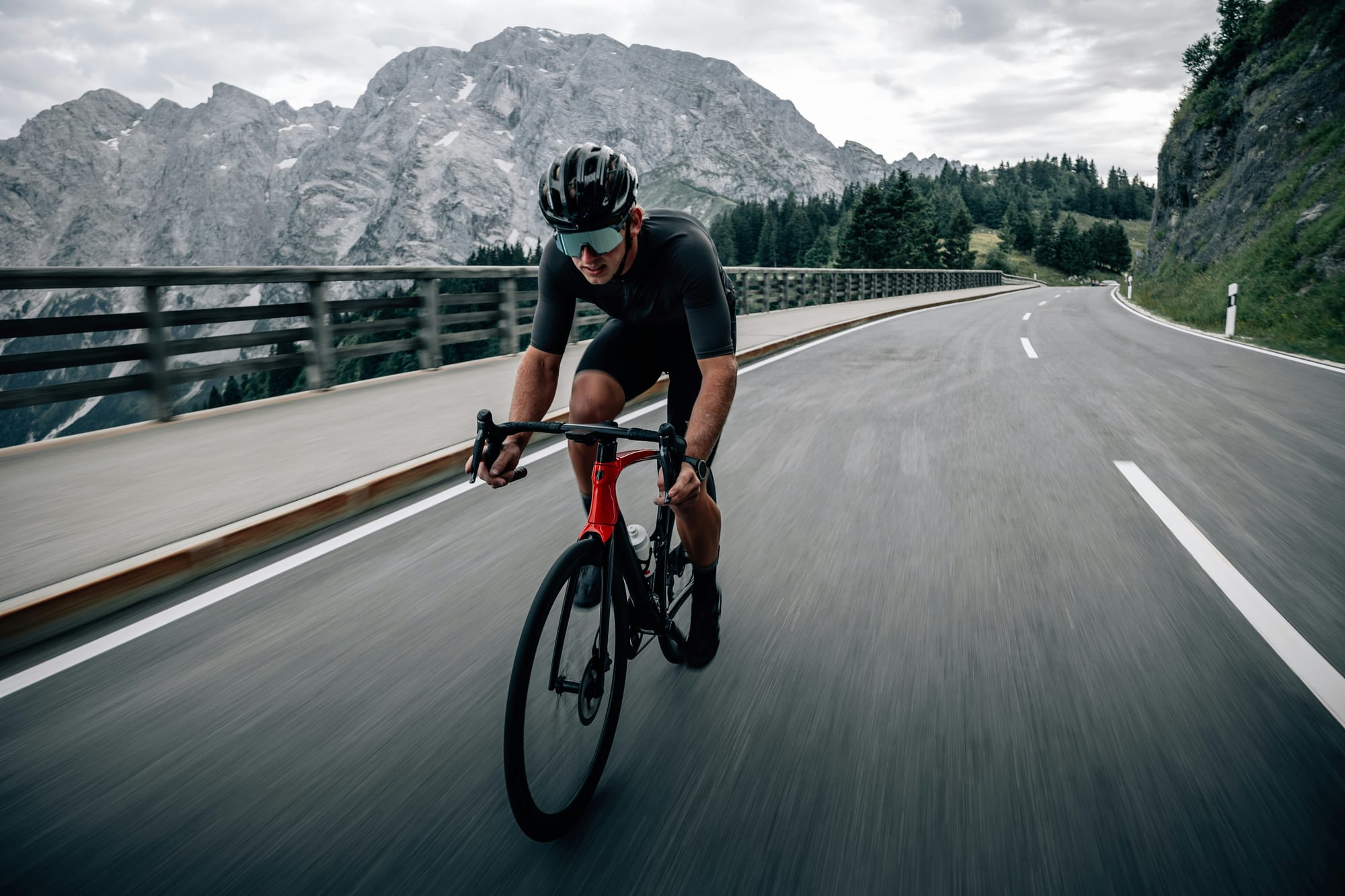 Road cyclist on an alpine mountain road